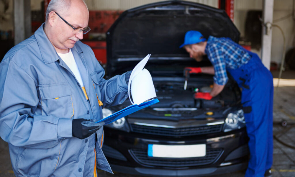 mechanics repairing car workshop 1024x683 1
