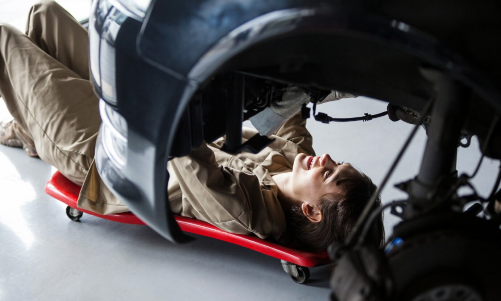 female mechanic repairing car 1170 1463 1