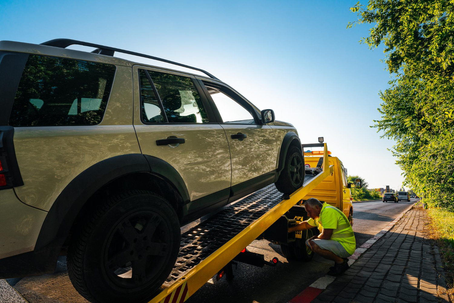Integrated towing Brooklyn NY tow truck loading car roadside